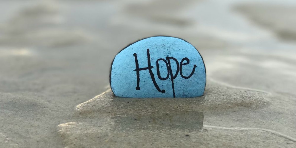 Blue hope-printed stone in photo.