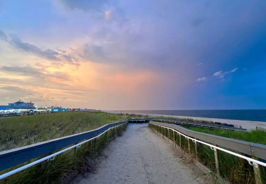 A sunset on the beach following a storm.